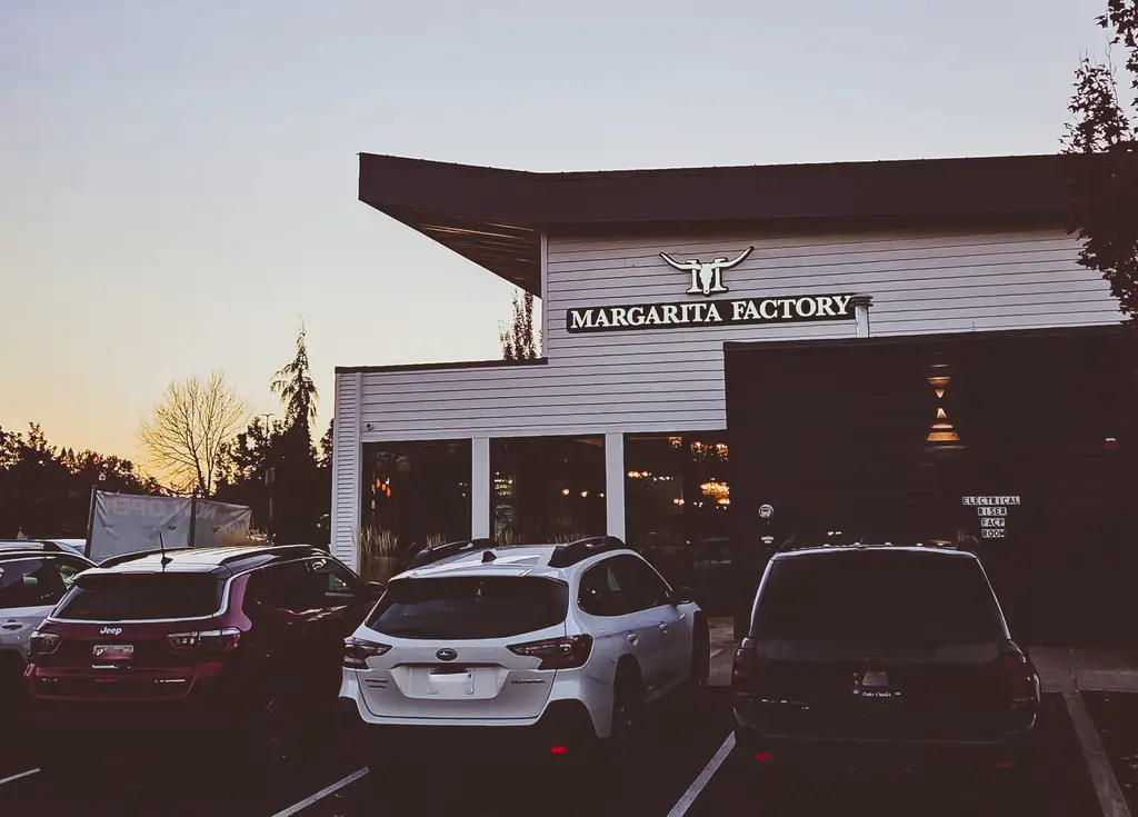 Illuminated Margarita Factory sign at dusk, fabricated in Woodland, WA