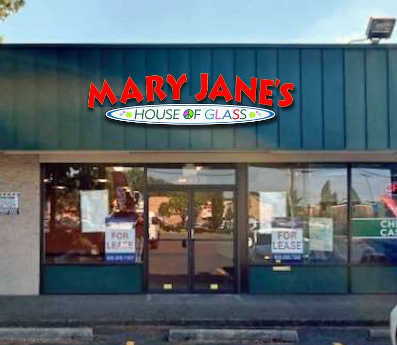 Mary Jane's House of Glass illuminated channel letter sign